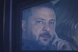 Ukraine's president Volodymyr Zelensky looks out from his car window as he arrives for the Nato Summit in Ankara